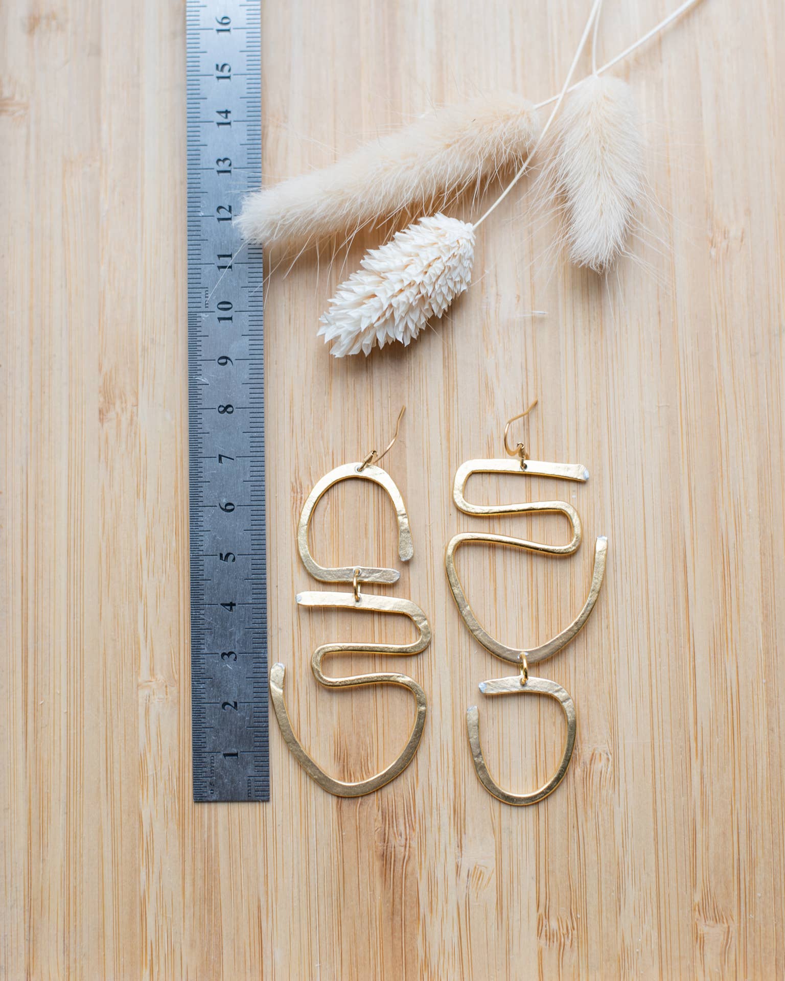 beautiful gold or silver graphic earrings for wholesale on Faire2