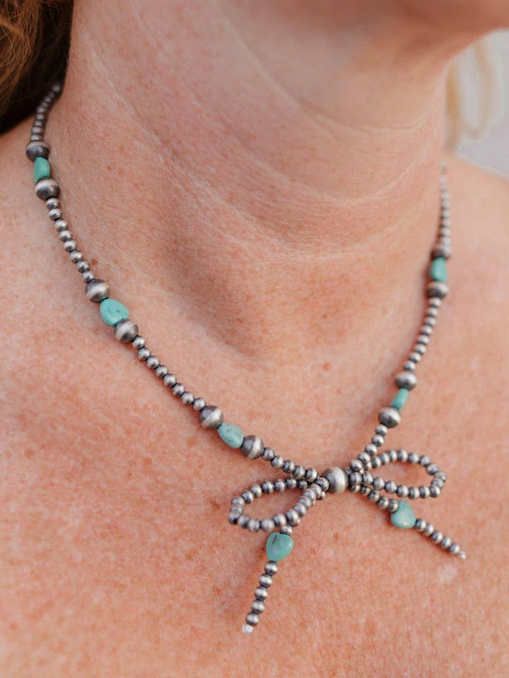 Turquoise Heart & Desert Pearl Bow Necklace for wholesale by Krush Kandy