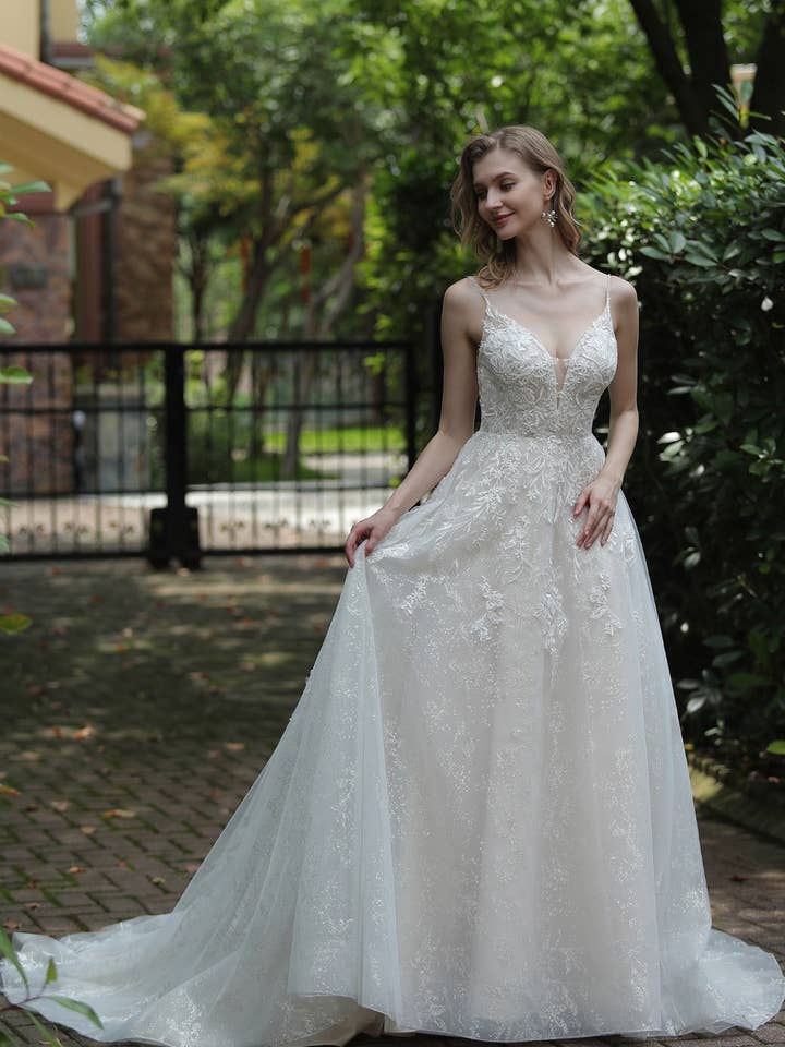Floral Lace Wedding Gown with Shimmering Tulle Underlay for wholesale by Bridal DIrect