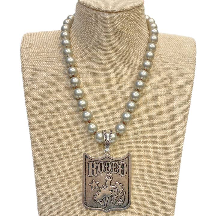 Accessories To Go - Wholesale Pendant/Charm Necklace - Rodeo (Horse Rider) Pendant on Faux Navajo Pearl Necklace