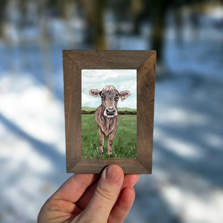 Brun schweizisk tryck i ram för wholesale av The Cranberry Finch