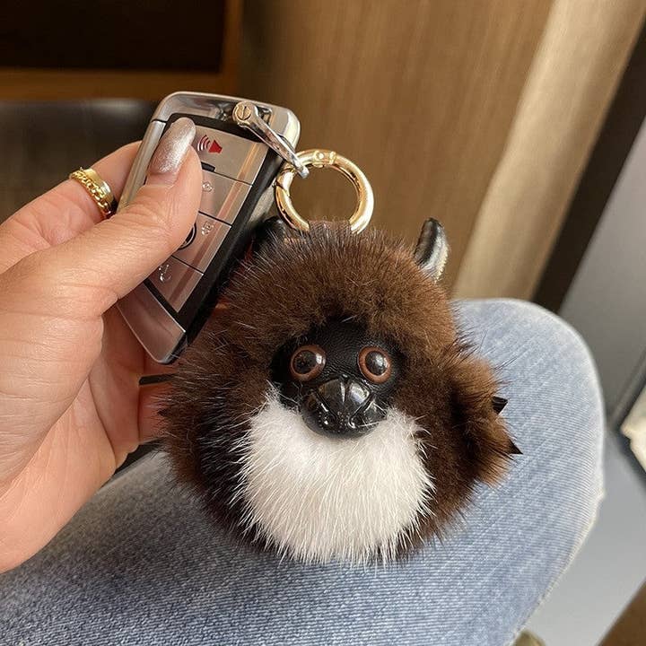 Cute Cow Keychain With Mink Fur for wholesale by UZ Wholesale Store