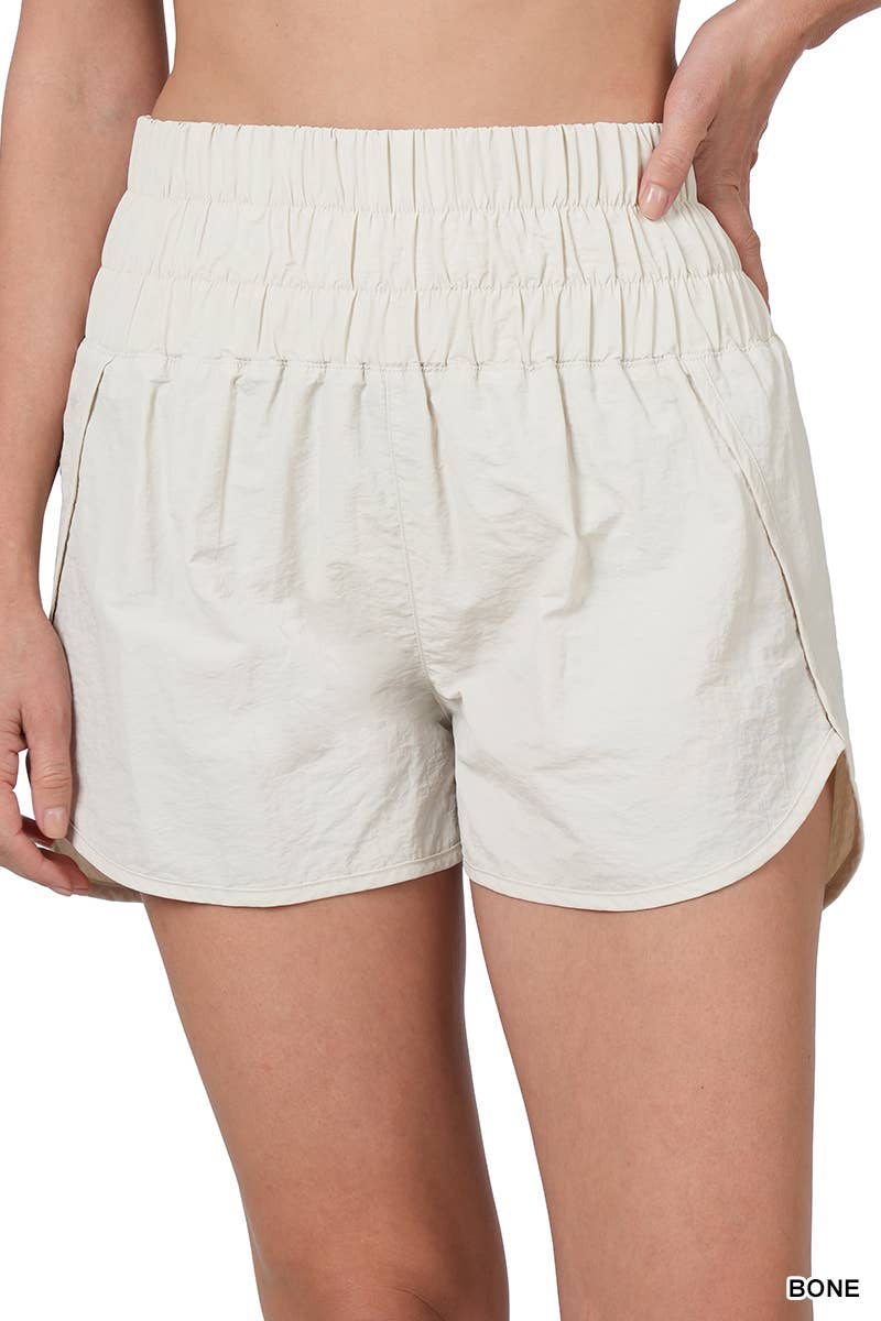 42POPS - Vente Short – femme - Short coupe-vent avec doublure et poche arrière en mesh40
