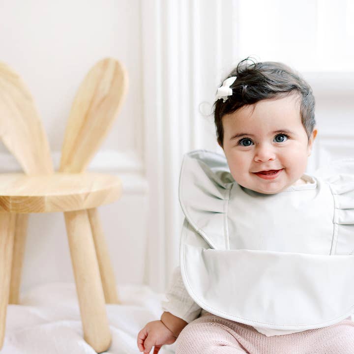 Sage Angel Bib Girls Ruffle Waterproof Baby Bib for wholesale by BIBTIQUE