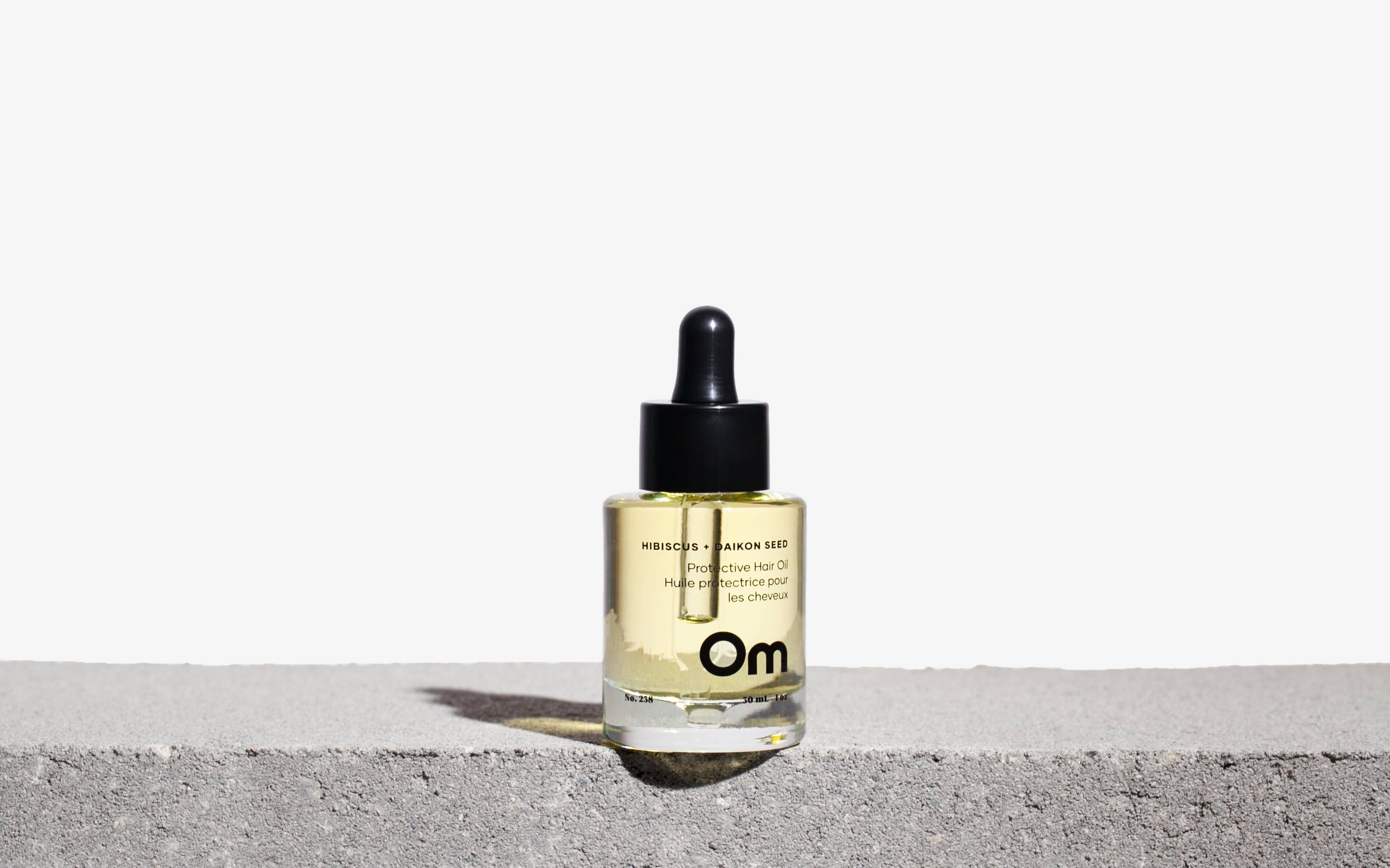 Om Organics Skincare - Wholesale Hair Oil - Hibiscus + Daikon Seed Protective Hair Oil