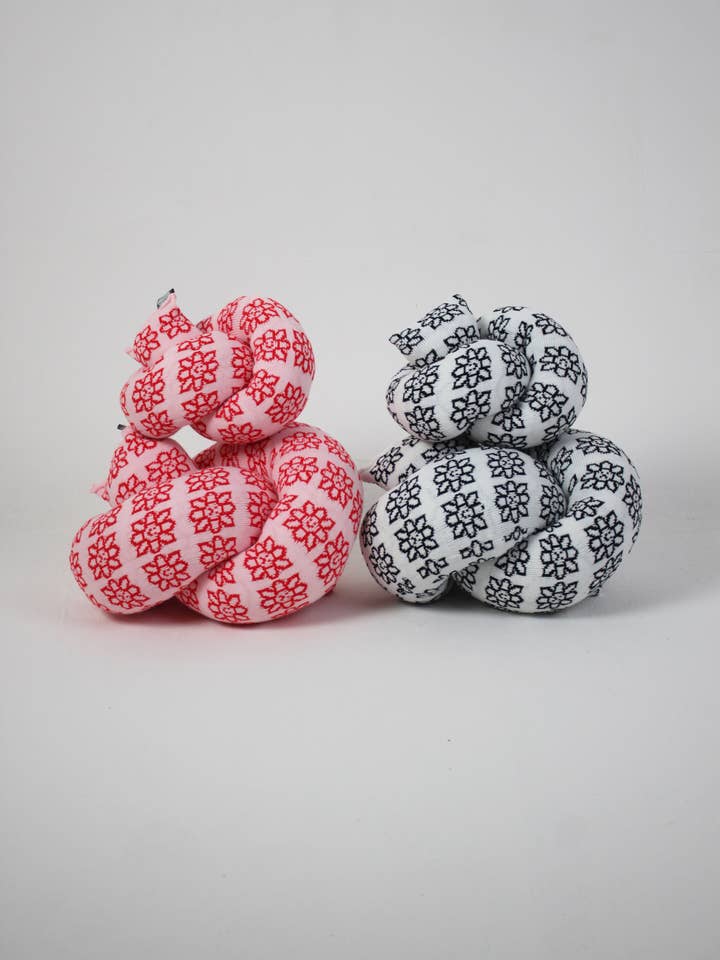 Maisie Daisy Knitted Knot Cushion for wholesale by Zebra Knits