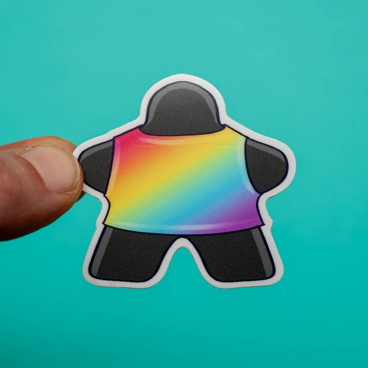 Rainbow Meeple sticker for wholesale by Crafty Queer Studio