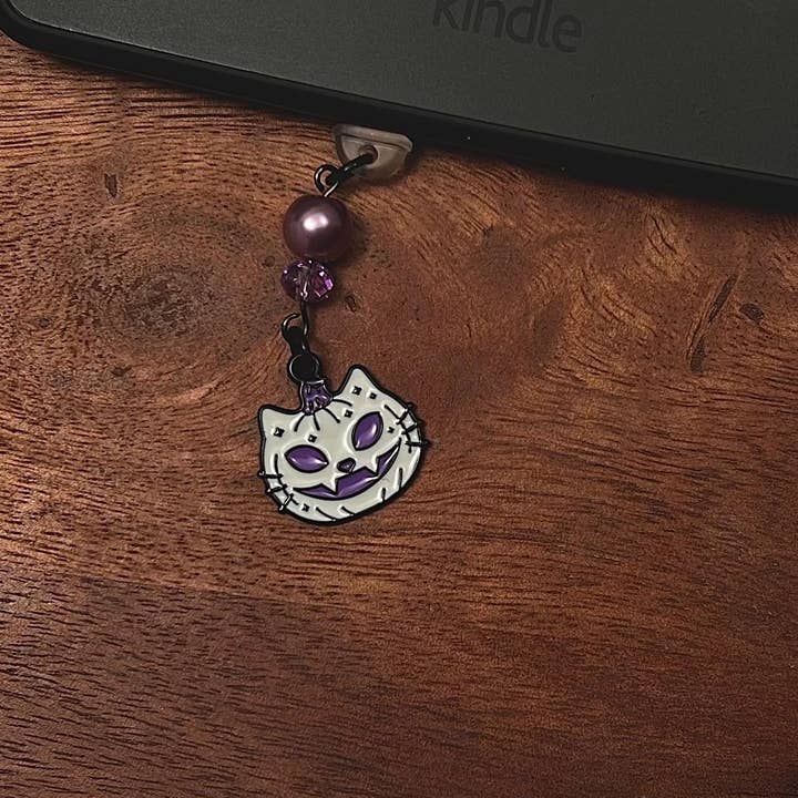 Jack-O-Lantern Cat Dust Plug For Devices & E-Readers for wholesale by Dagger and Rose