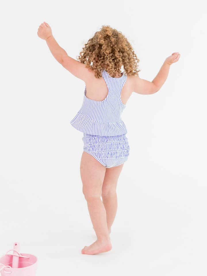 RuffleButts + RuggedButts – wholesale Two-piece swimsuit – Kids – Girls Periwinkle Blue Seersucker Peplum Tankini 2-Piece Swimsuit with Signature Rear Ruffles
4