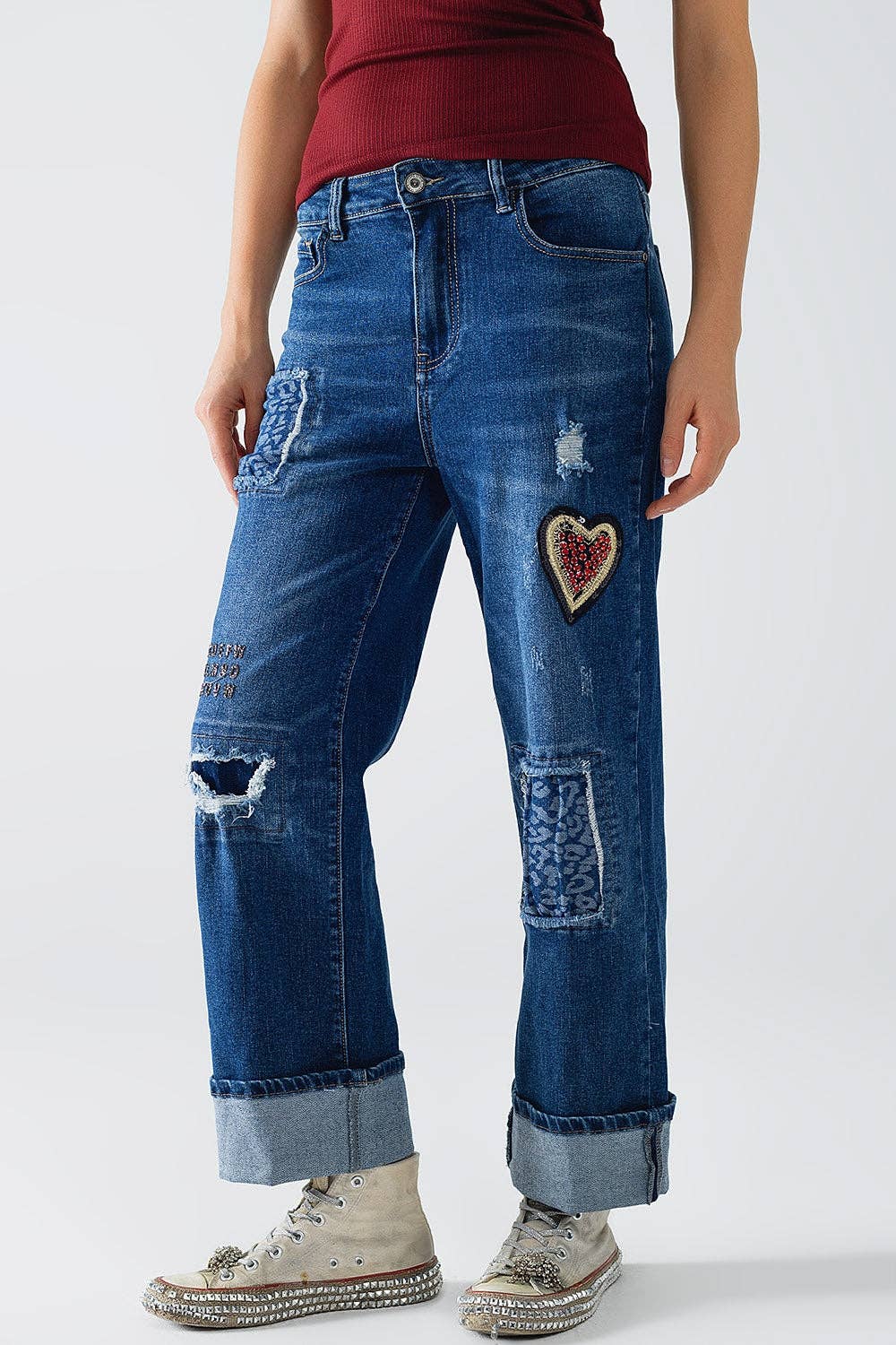 Blue Wide leg jeans embellished with some patches for wholesale on Faire4