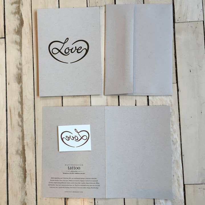 Biglietto di auguri Love Manifestation Tattoo per la vendita all'ingrosso da parte di Conscious Ink