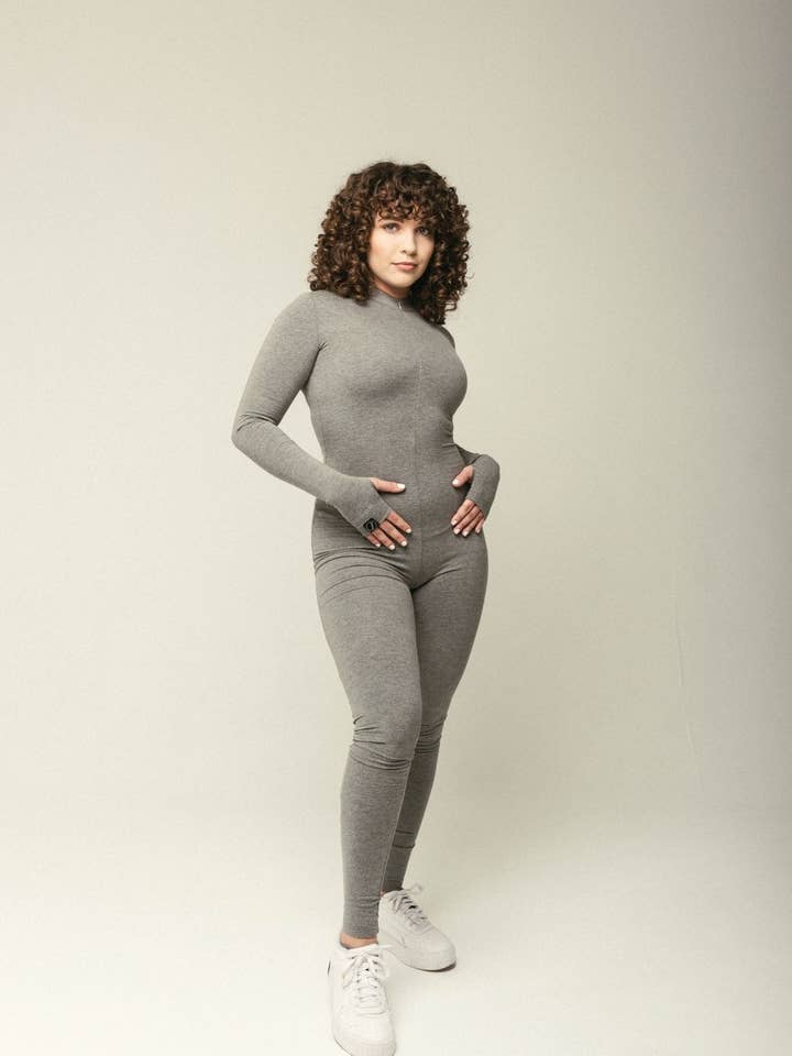 Rise Up Long Sleeve Grey Jumpsuit for wholesale by JusRédor Collection