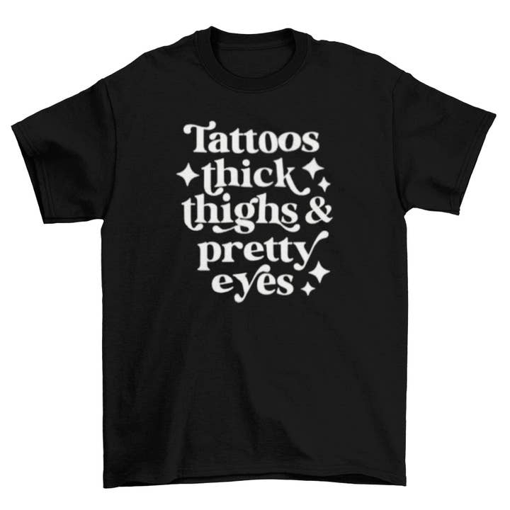 Wickedly Divine Shop – T-shirt estampada - Mulher por atacado – Camisa Grossa, Tatutoo Pretty Eyes, Tatutoo Lover