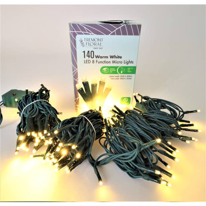 140ct. Warm White LED 8 Function Micro Lights Green Cord for wholesale by Tremont Floral Supplies