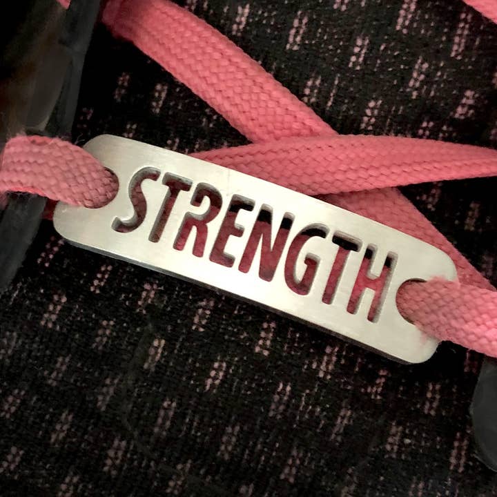 STYRKA Sko Tag för wholesale av ATHLETE INSPIRED, Inc.