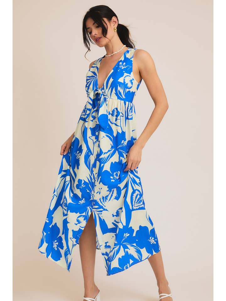V-NECK FRONT TIE SLEEVELESS BUTTON UP TROPICAL PRINT DRESS for wholesale on Faire