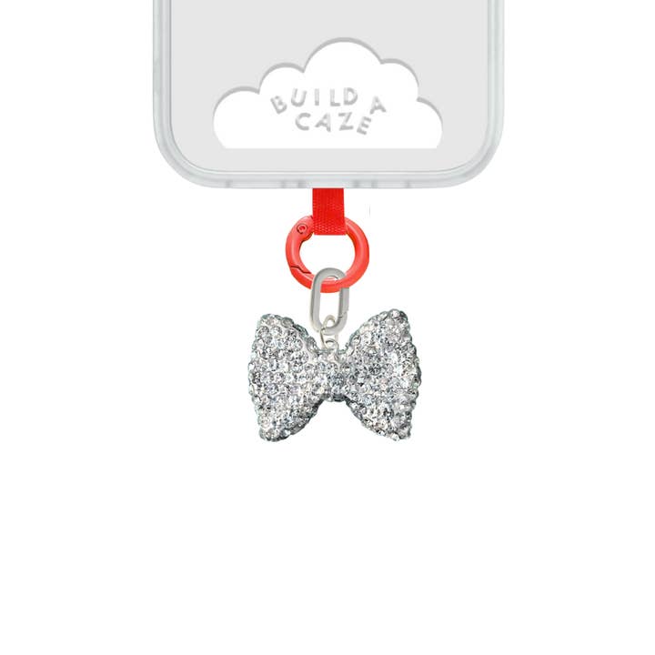 Éclat d'Argent et Charme d'Arc pour la vente par Build a Caze