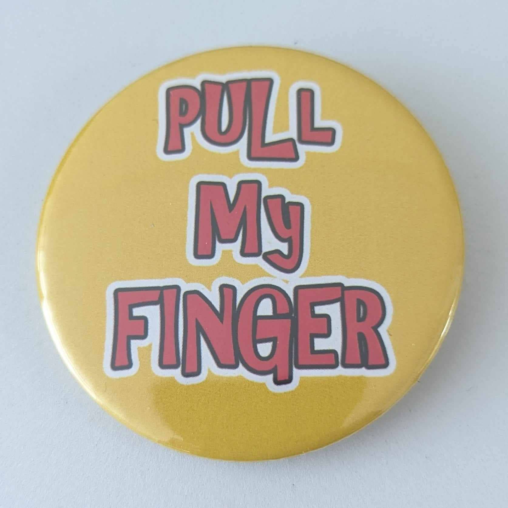 Go La La – wholesale Lapel pin/button – Pull My Finger - 58mm  humour badge   0