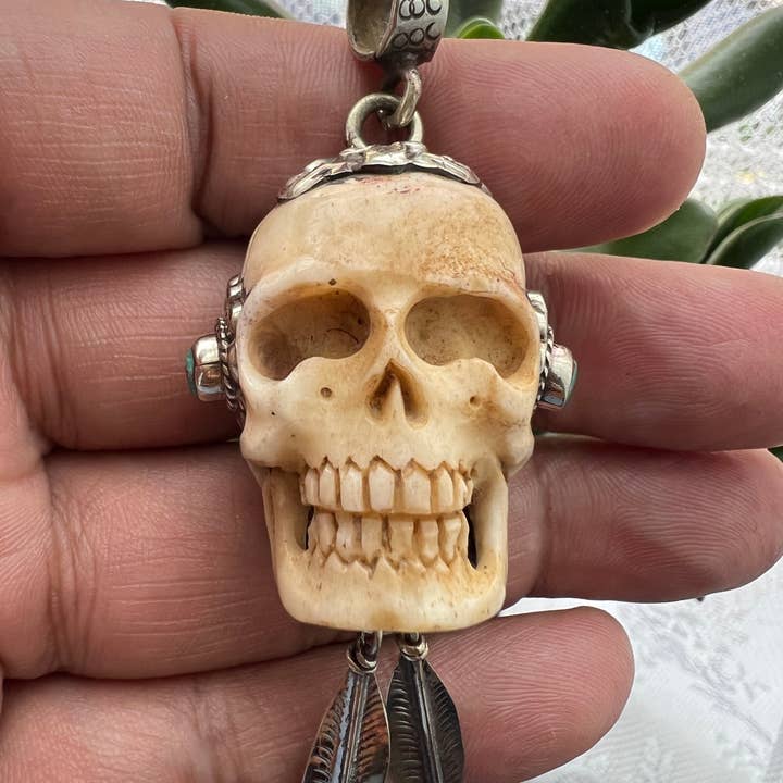 Bone carved Skull pendant set with turquoise , Handcrafted for wholesale by GTG Gems Corp