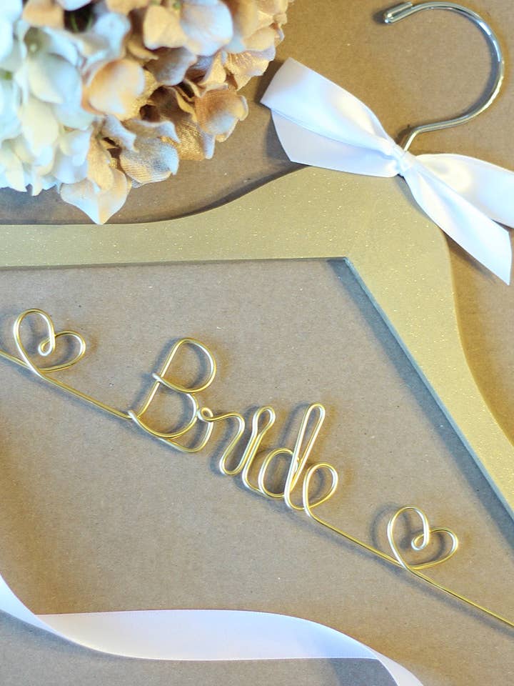Gold or Silver Bride Hanger with Hearts, Wedding Hanger and other Purchase Wholesale bride to be. Free Returns & Net 60 Terms on Faire trending on Faire.