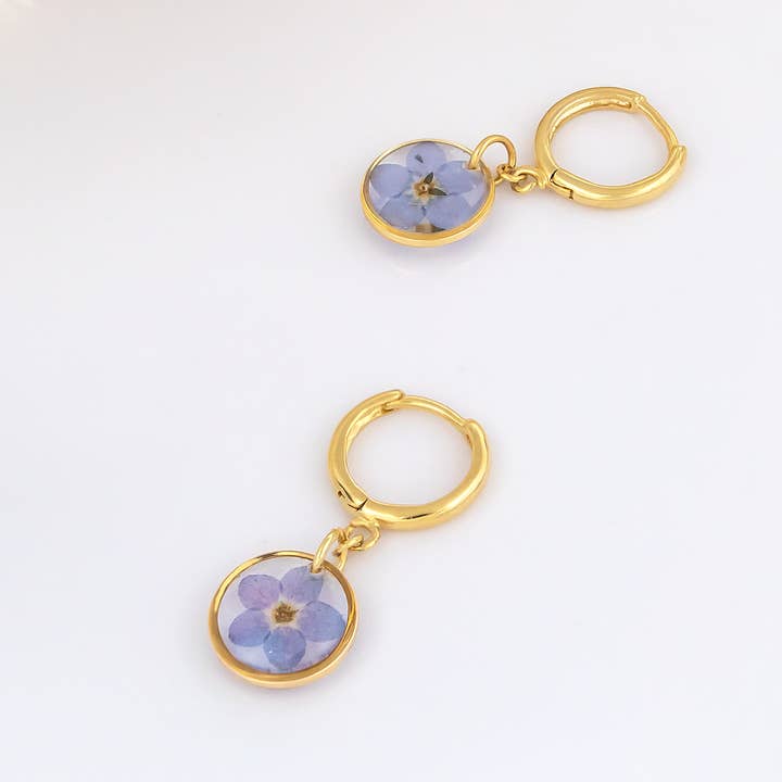 Amalia Round real forget-me-not resin huggie hoop earrings for wholesale by Allie and Posie
