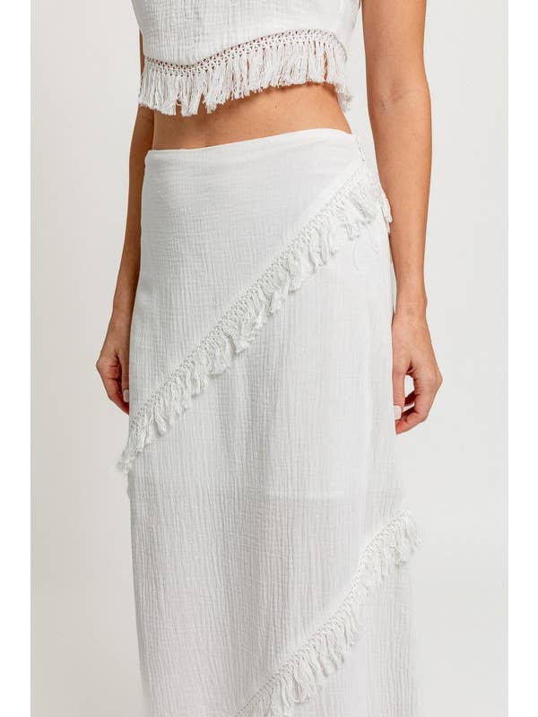White LOW WAIST FRINGE TRIMMED MAXI SKIRT for wholesale on Faire