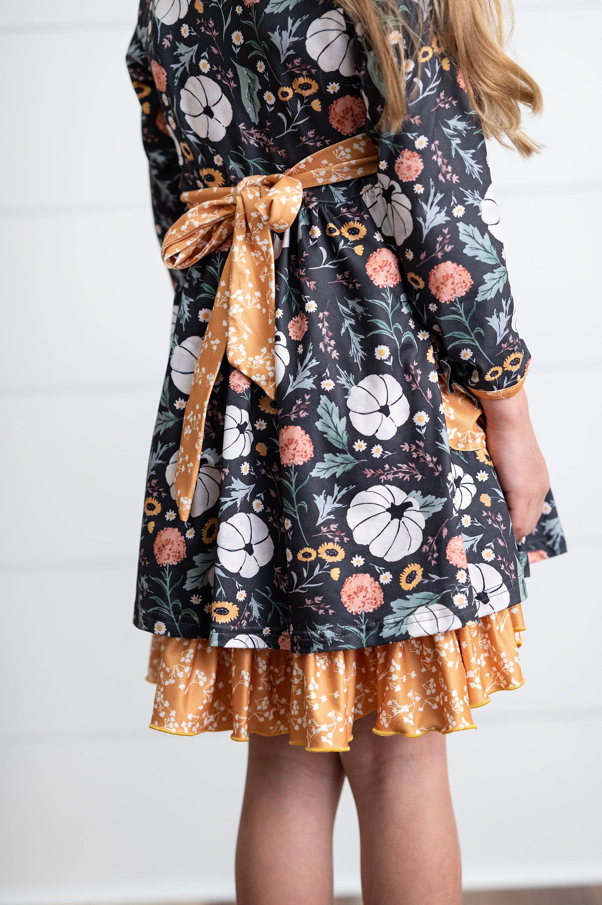 Oopsie Daisy - Wholesale Dress - Kids - Girls Mustard Pumpkin Ruffle Pocket Button Tie Fall Dress2