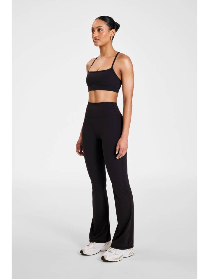 Black ALLFENIX CloudCore Flared Legging for wholesale on Faire