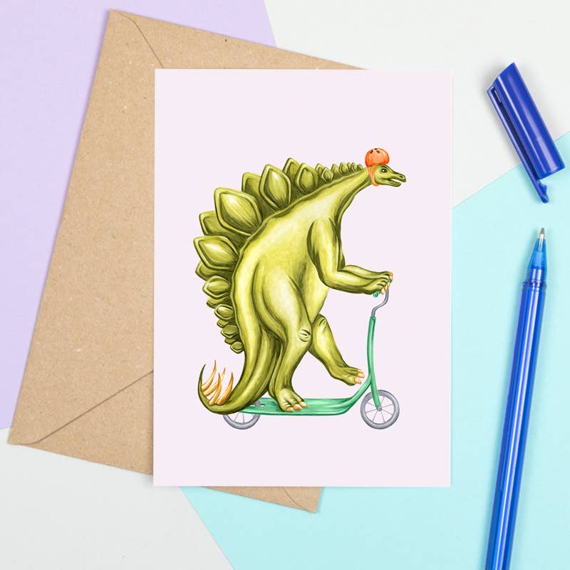 Sardines Studio - Wholesale Everyday Greeting Card - Stegosaurus riding a scooter Greeting Card1