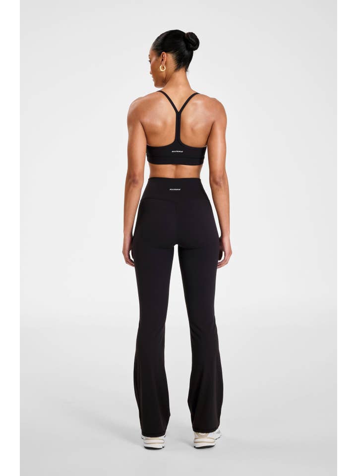 Black ALLFENIX CloudCore Flared Legging for wholesale on Faire