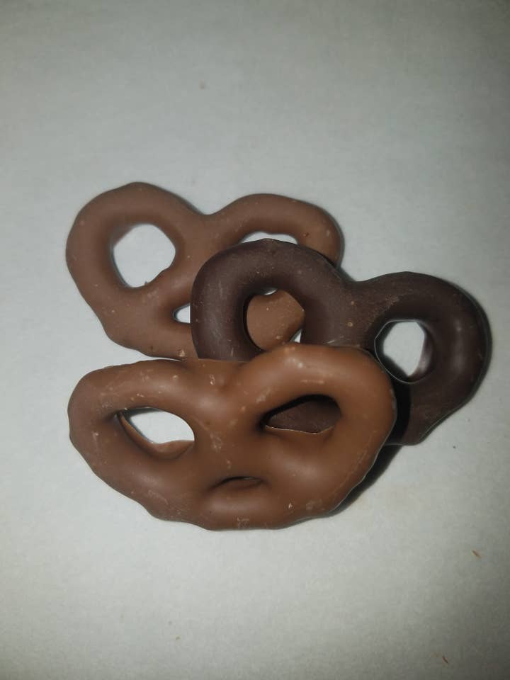 Chocolate covered Mini Bow Pretzels for wholesale by Skip's Candies (Nut Free)