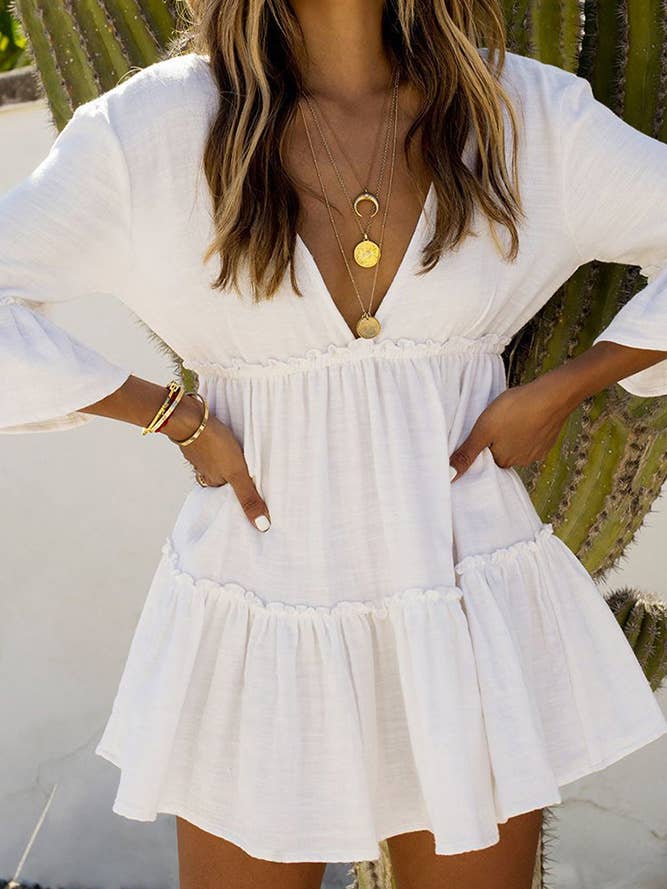 Vestido de playa blanco con volantes y empalme ZZKF1081 para venta al por mayor de UNISHE