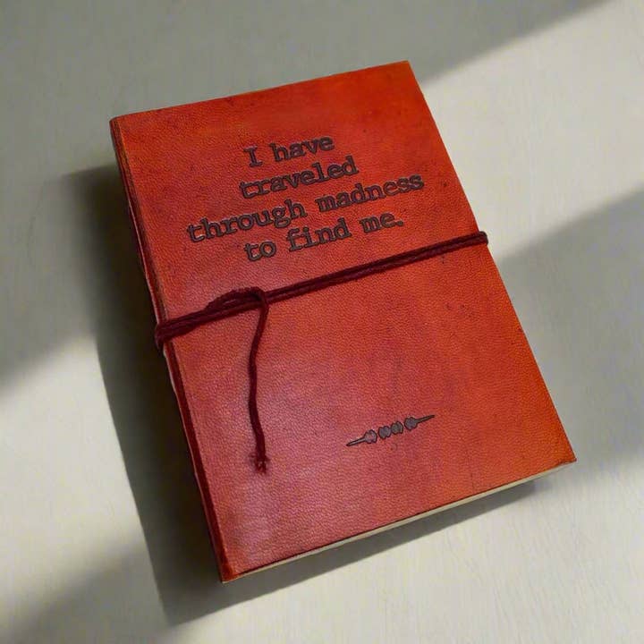 Madness Quote Leather Journal - 5x7 Lined for wholesale by Soothi | Containers Of Creativity