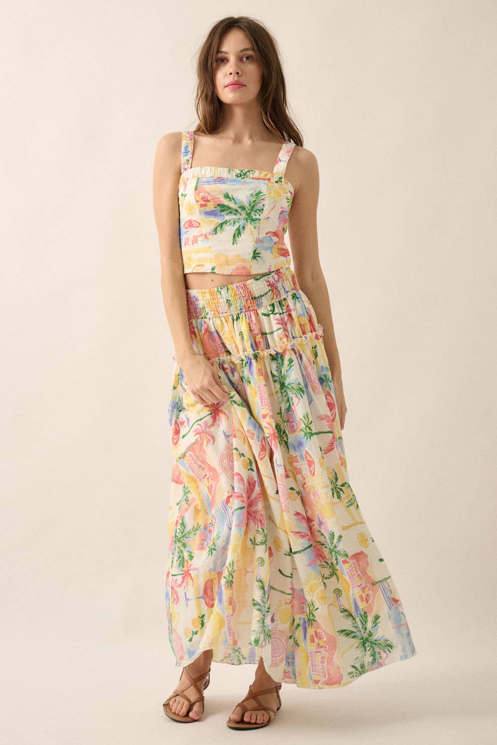 Crème Jupe longue smockée à imprimé aquarelle tropical. en vente sur Faire4