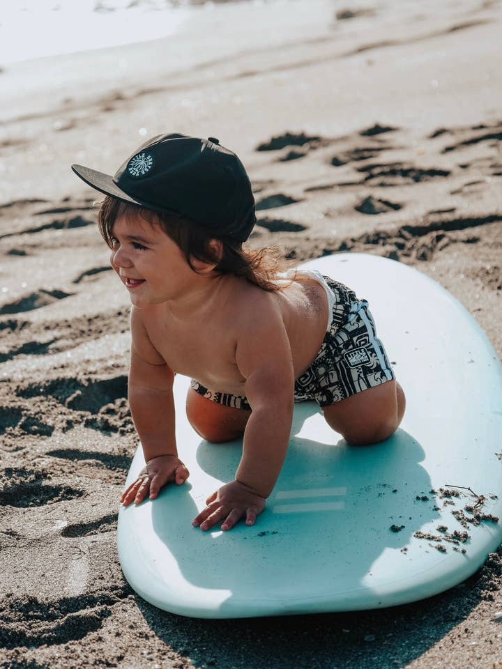The Little Surfer Dude - Wholesale Swim Shorts - Kids - Vintage Black Swell Swim Trunks2