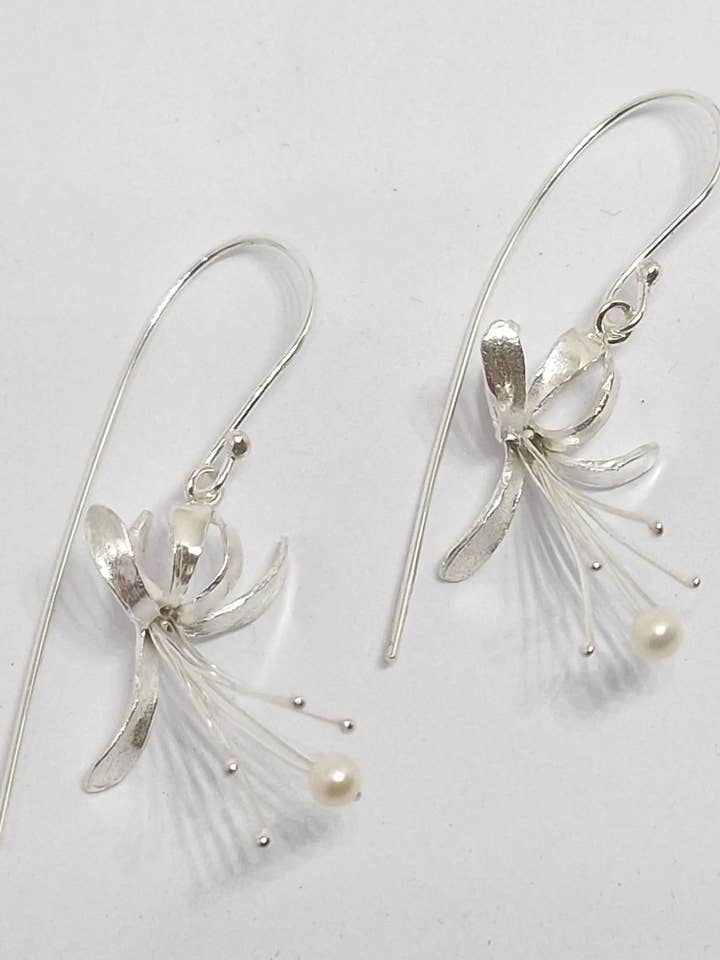 Honeysuckle drops hand made from Sterling Silver set with a for wholesale by Andrew O'Dell Jewellery