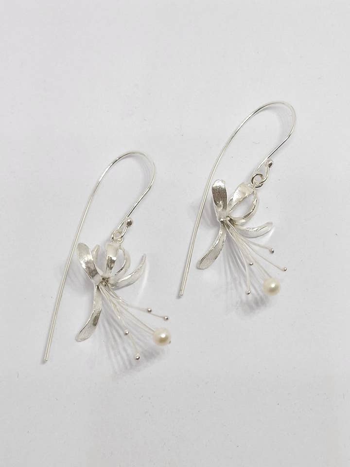 Honeysuckle drops hand made from Sterling Silver set with a for wholesale by Andrew O'Dell Jewellery