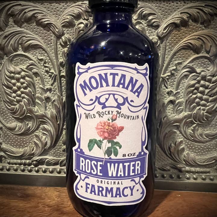 Rocky Mountain Montana Wild Rose Water in cobalt glass for wholesale by Montana Farmacy
