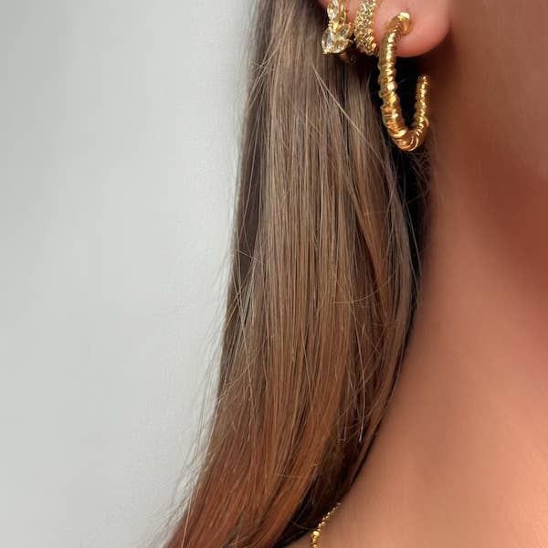 Nawa-øreringe for engroshandel hos Horizonandjoyas