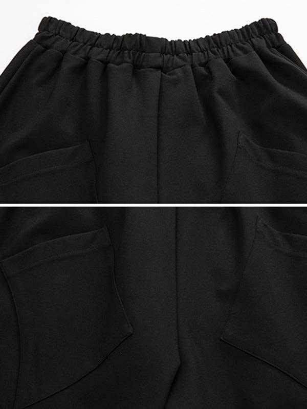 NEGRO Elegantes pantalones harén de elasticidad sólida de venta al por mayor en Faire9