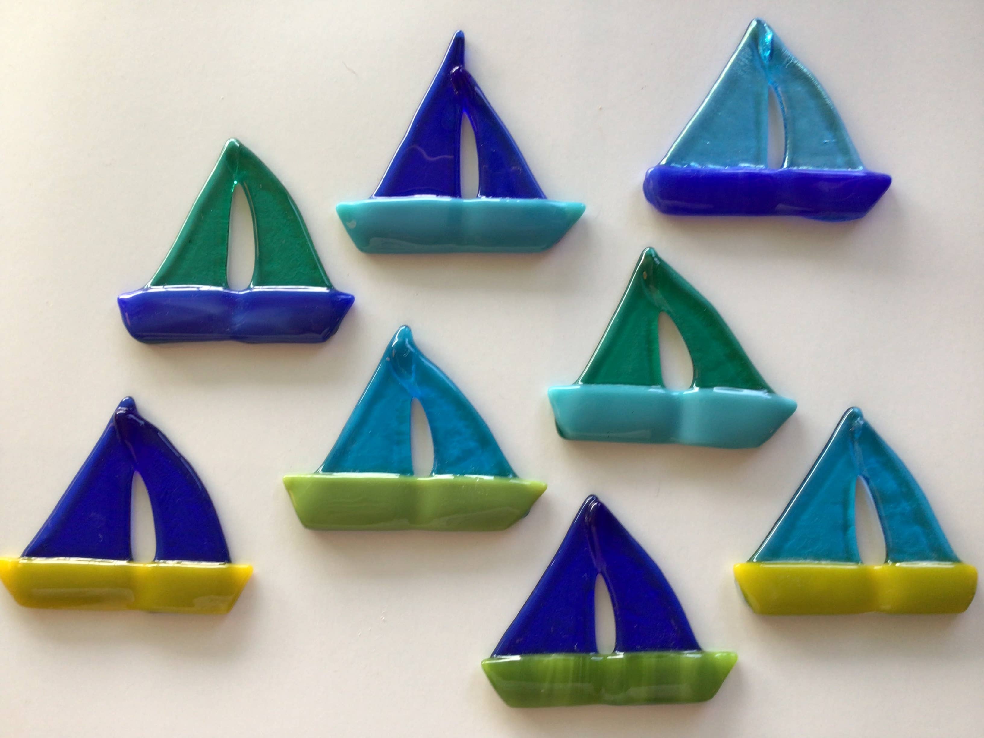 Shades of blues teals greens and yellows Sailboat ornament for wholesale on Faire6