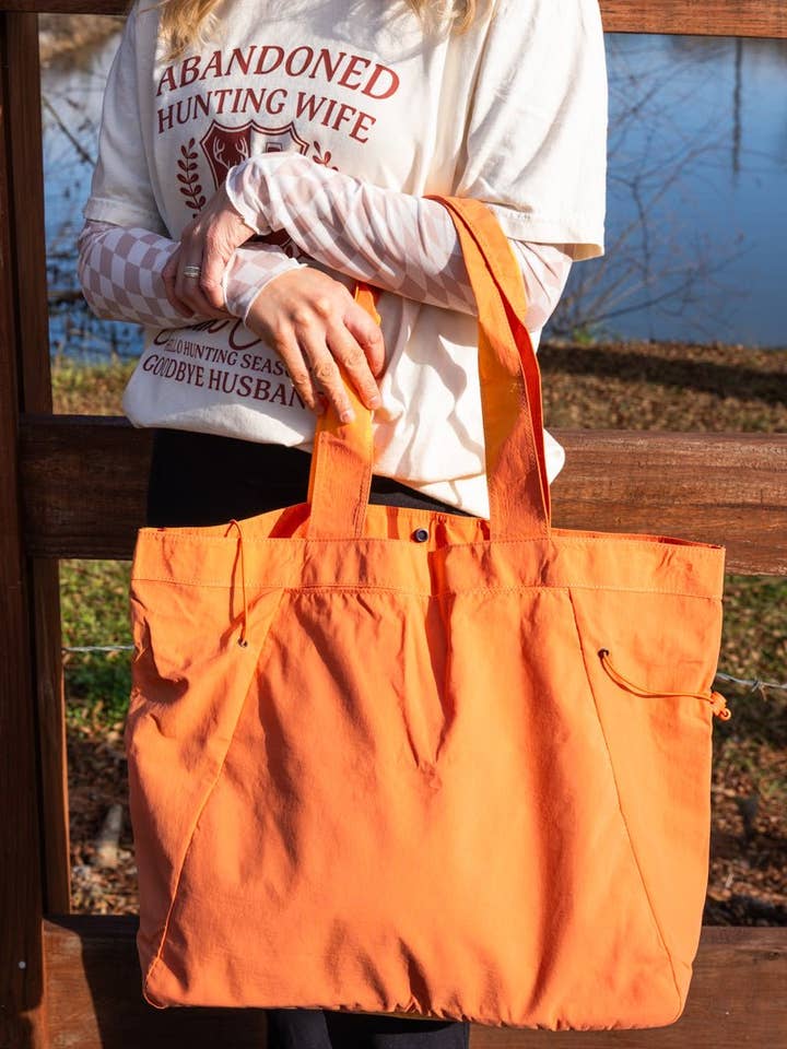 NGIL Orange Shoreview Side Cinched Tote Bag for wholesale by Wholesale Accessory Market