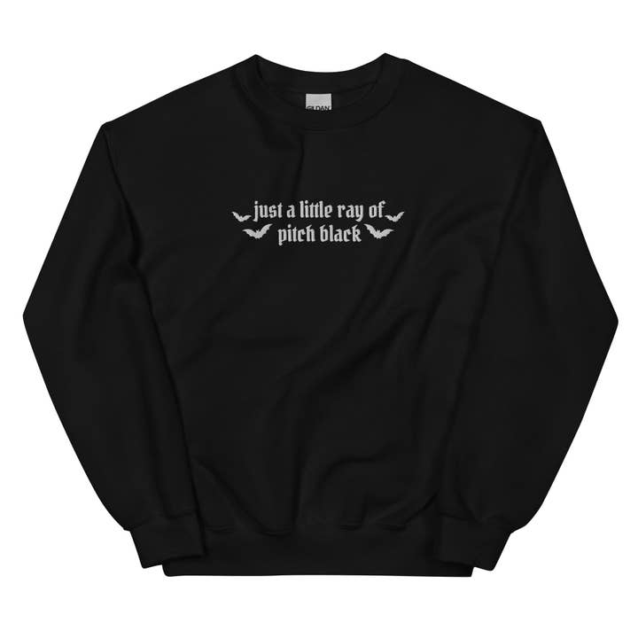 Ray of pitch black Sweatshirt for wholesale by Salty Skeleton Co.