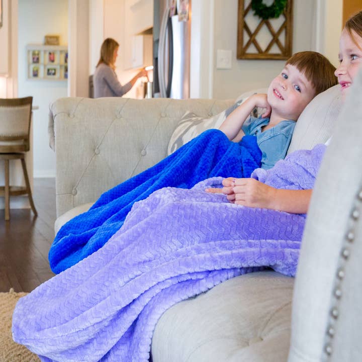 Kids Blanket With a Foot Pocket in Lively Lilac for wholesale by PediPocket: The Foot Pocket Blanket