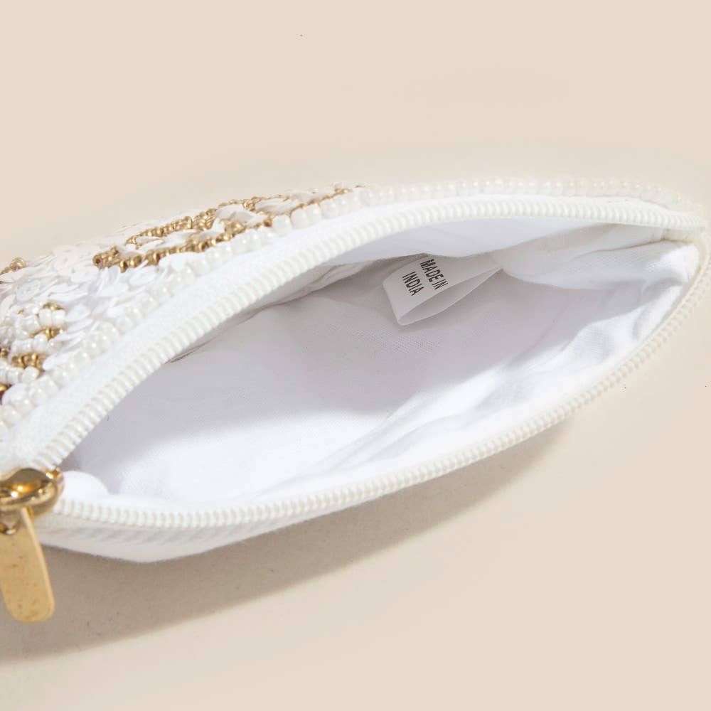 MULTI Portamonete con Perline a Forma di Stella Marina, Vongole e Vita Marina in vendita all'ingrosso su Faire2