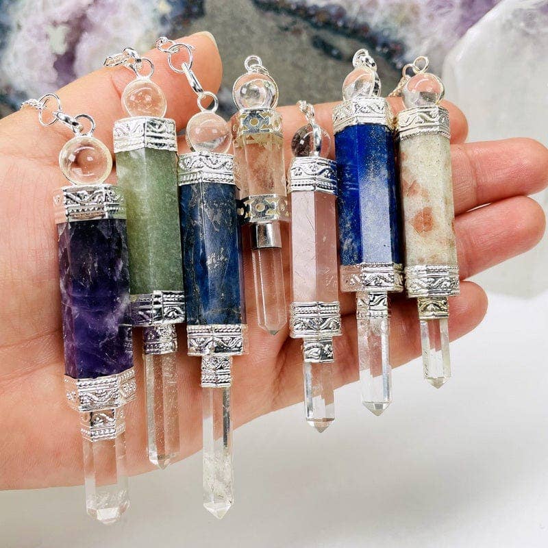 Rock Paradise – wholesale Meditation supplies – Crystal Quartz Point Pendulum with Silver toned Chain2