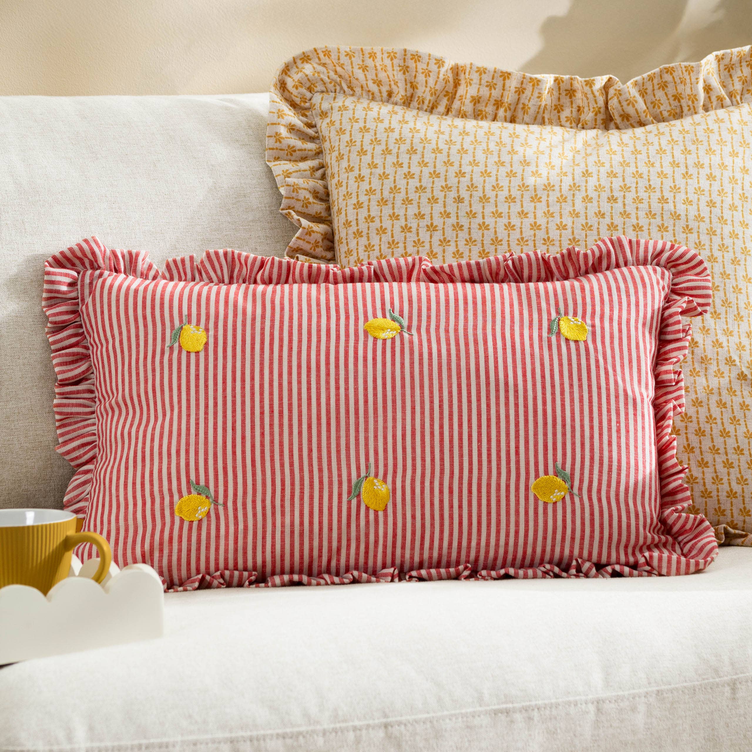 Les Fruites Embroidered Ruffle Cushion Lemons for wholesale on Faire0