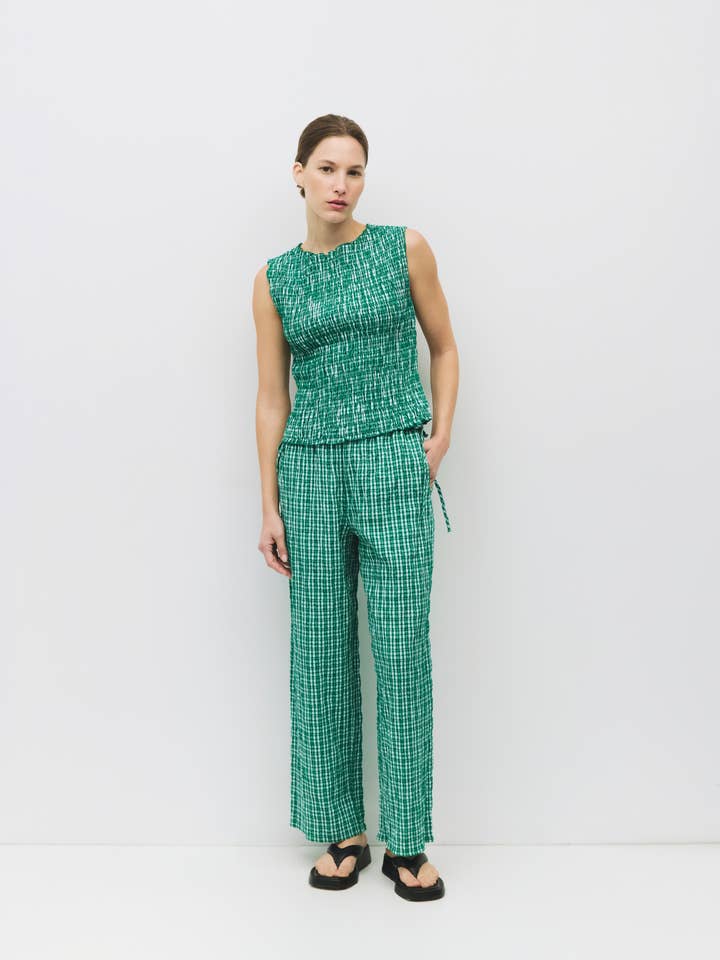 Pantalon Ebony à carreaux, jambes larges avec liens à la taille pour la vente par MOD REF