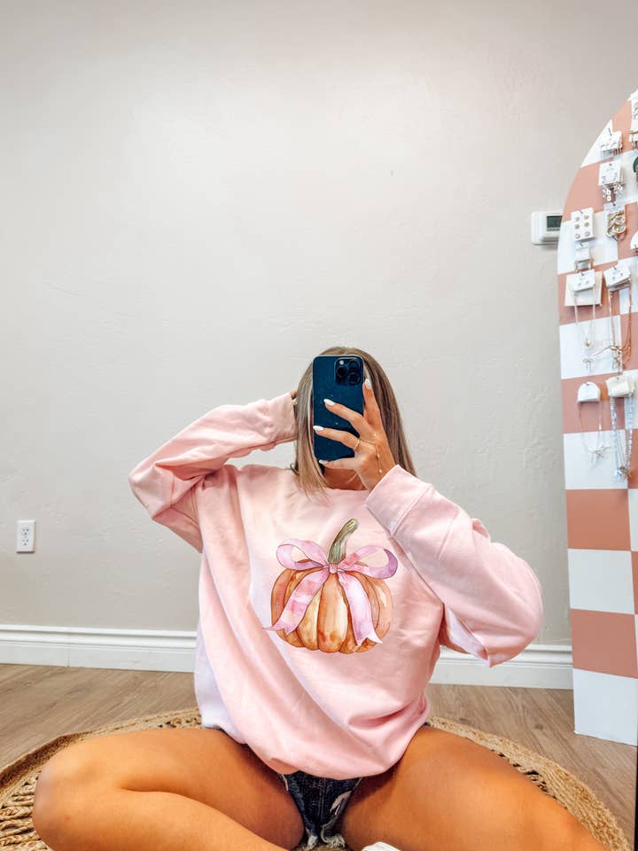 Halloween sweatshirt distressed bow pumpkin girly autumn for wholesale by Broke Babes Wholesale