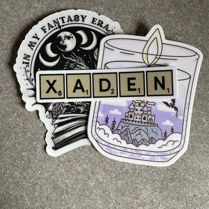 Merry May - Wholesale Sticker - Xaden Game Tiles Vinyl Sticker, 3.0” x 0.68”3